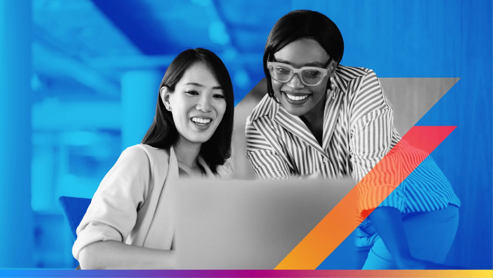 two people watching a laptop computer - the featured image for the connected tv advertising article