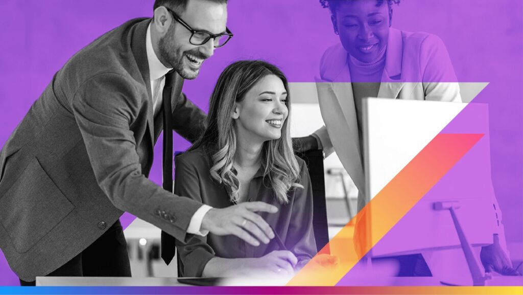 three people looking at a computer -featured image for the Forrester State of AI for cross-channel marketing hubs report landing page