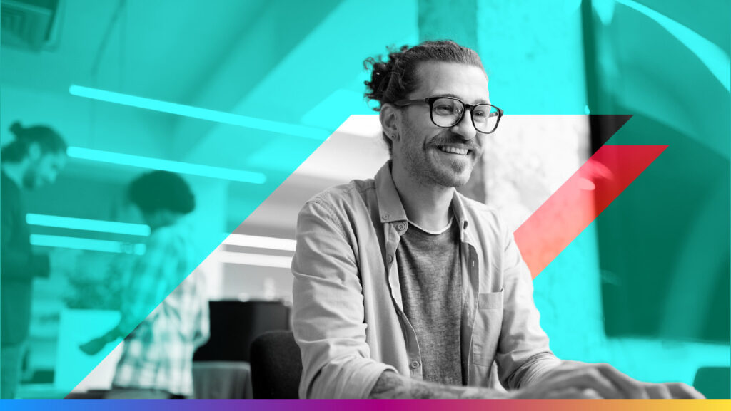 Person looking at computer smiling