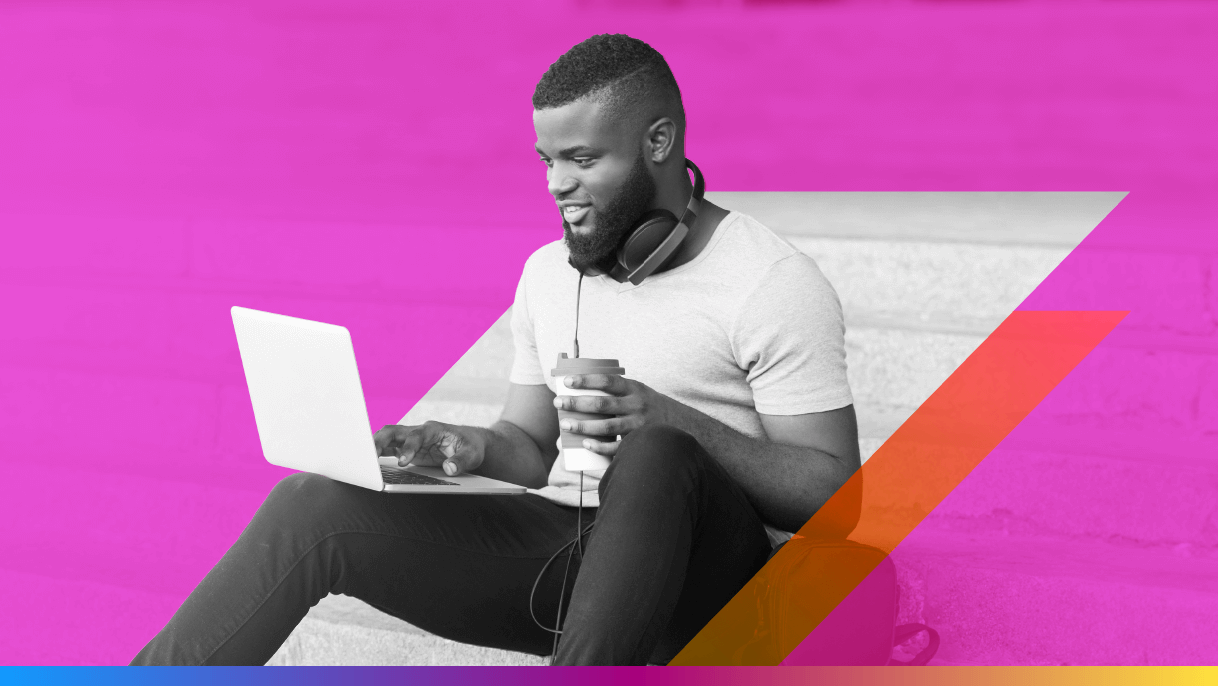 person sitting on stairs with a laptop and to-go coffee - featured image for AI for Marketing guide