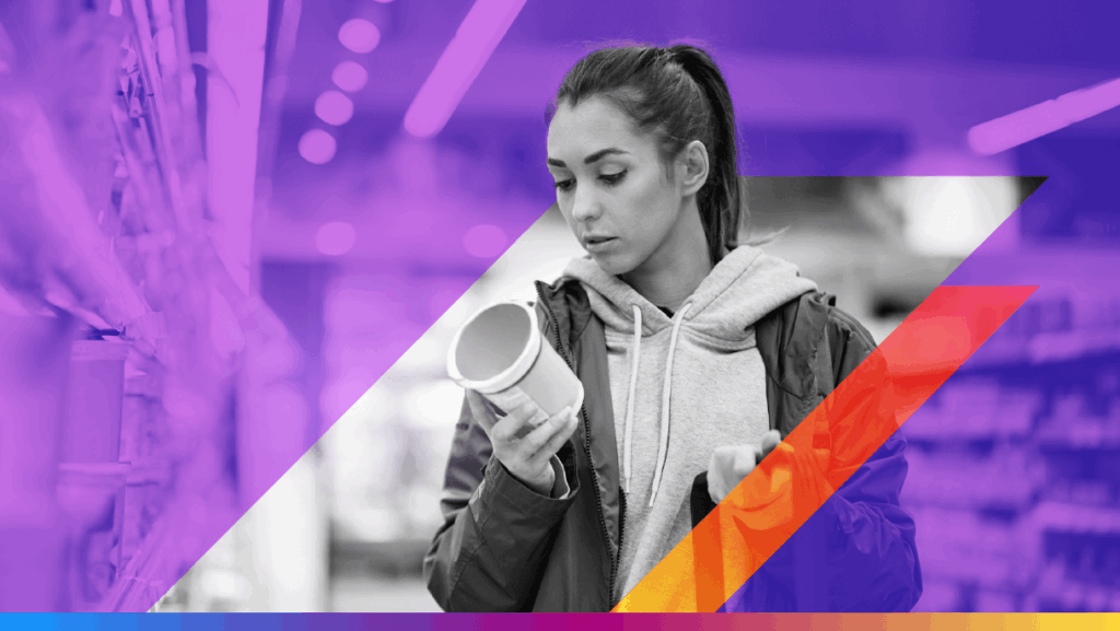 a person looking at a label while shopping - featured image for redefining marketing attribution article