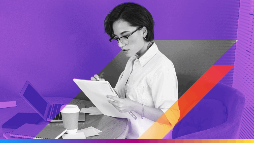 image to promote email marketing automation strategy article - a person writing in notebook